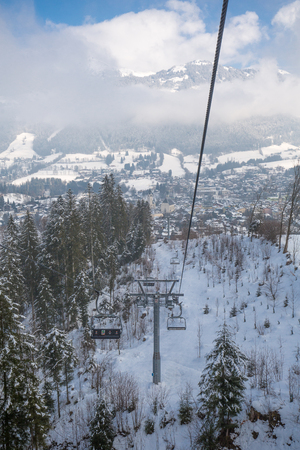 Mountain ski resort cableway, ski lift, in winterの写真素材