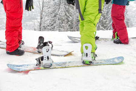 Snowboarder in winter forest mountains, backgroundの写真素材
