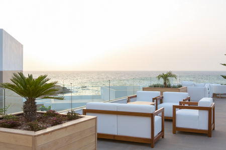 Sunset in cafe bar in sea hotel resortの写真素材
