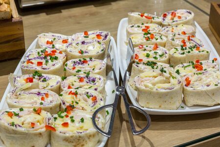 Wrapped tortilla served on plateの写真素材