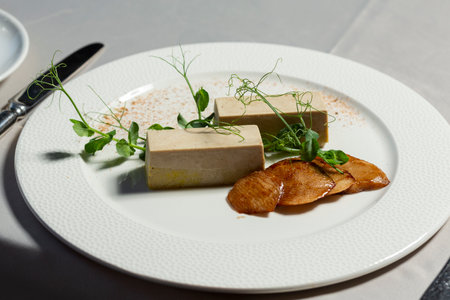 Goose liver pate served on a white plateの写真素材
