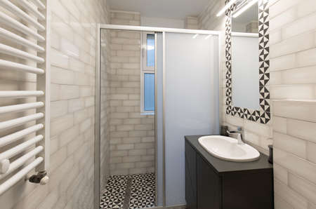 Interior of a bathroom with shower cabin