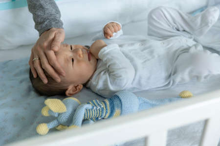 Portrait of adorable Japanese baby boyの写真素材