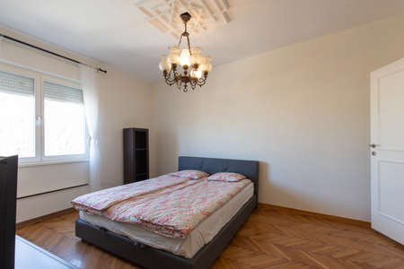 Interior of a apartment bedroom with double master bedの写真素材