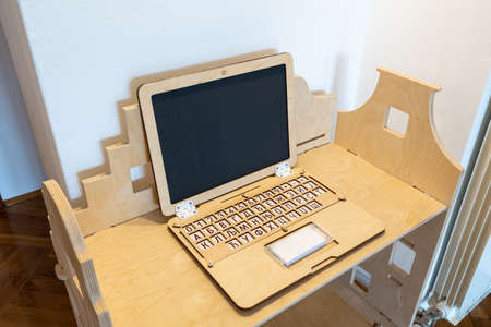 Wooden notebook in montessori kindergarten