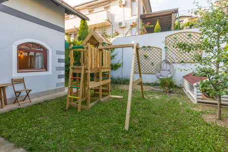 Outdoor wooden playground in the summerの写真素材
