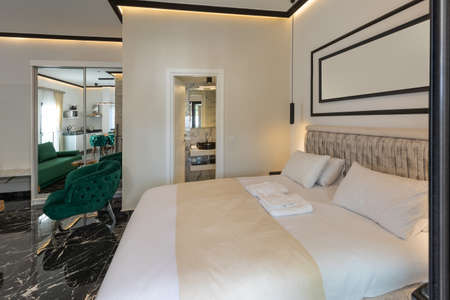 Interior of a luxury bedroom with marble floorの写真素材