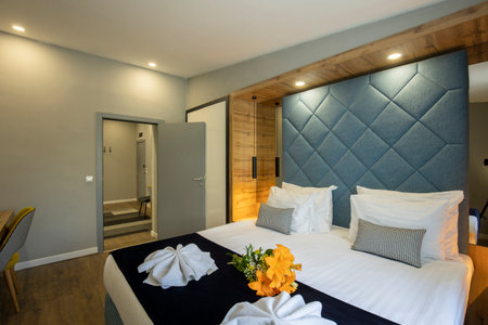 Interior of a double bed hotel bedroomの写真素材