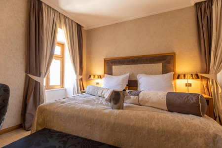 Interior of a luxury hotel bedroomの写真素材