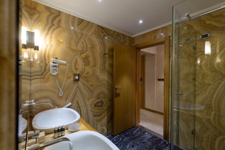 Interior of a luxury hotel bathroom with marble wallsの写真素材