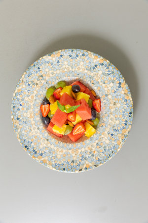 Mixed fruit salad served on a plateの写真素材