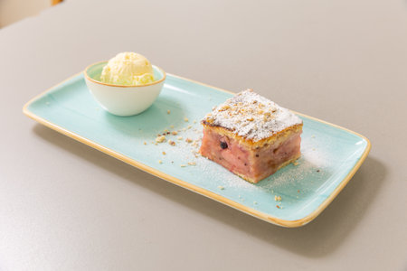 Apple pie served with vanilla ice creamの写真素材