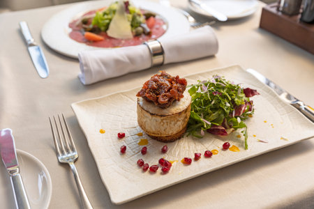 Grilled halloumi cheese with arugula and caramelized pearの写真素材