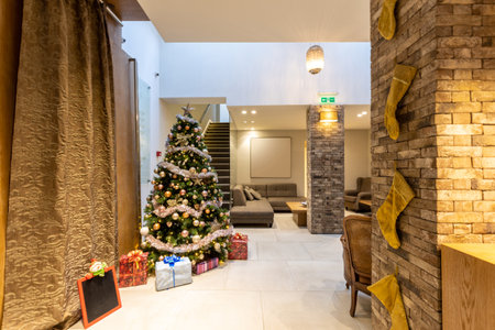 Christmas decorated hotel lobby with reception deskの写真素材