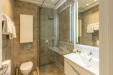 Bathroom interior with glass shower cabinの写真素材