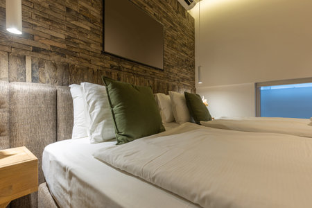 Interior of a hotel bedroom with master bedの写真素材