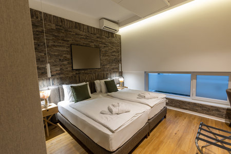 Interior of a hotel bedroom with master bedの写真素材