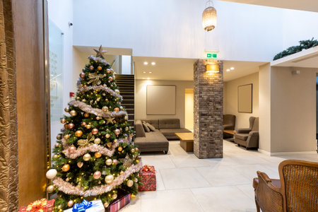 Interior of a hotel lobby with decorated Christmas treeの写真素材