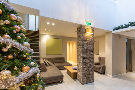 Interior of a hotel lobby with decorated Christmas treeの写真素材