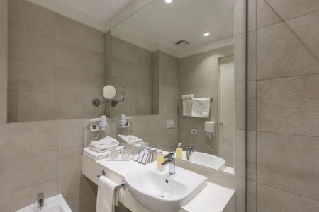 Bathroom interior with glass shower cabinの写真素材