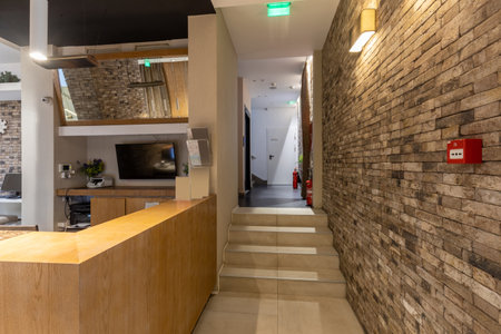 Hotel lobby with decorated stone wallの写真素材