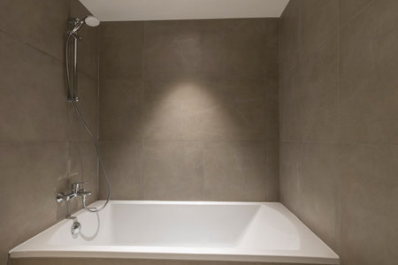 Bathtub in small bathroom interiorの写真素材