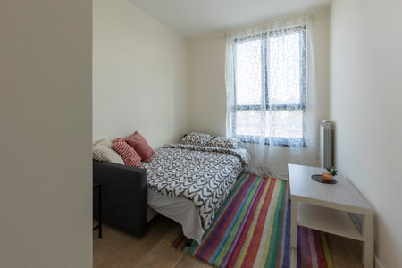 Bedroom interior in rental apartmentの写真素材