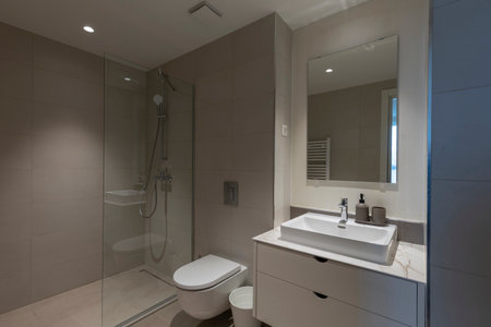 Bathroom interior with glass shower cabinの写真素材