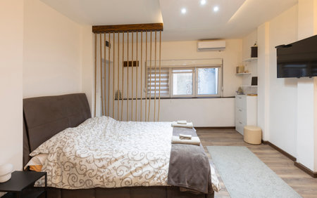 Bedroom interior in rental apartmentの写真素材