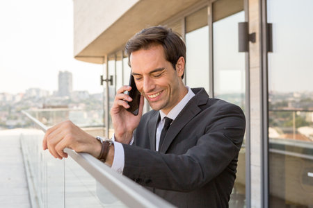 Businessman talking on the mobile phoneの写真素材