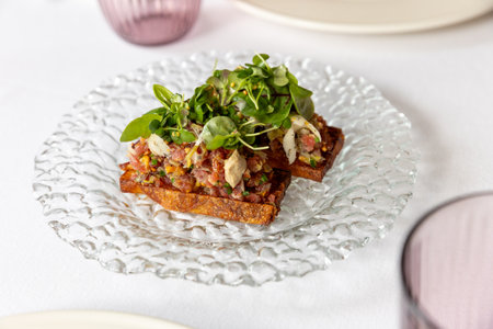 Steak tartare on a breadの写真素材