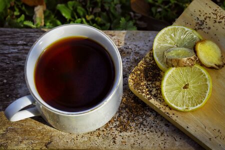 Tea served with lemon and gingerの写真素材