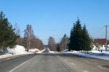 It is a winter road in Lithuania.の写真素材