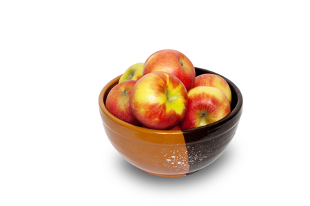 Red apples in bowl isolated on white background.の写真素材