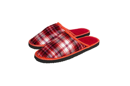 red slippers on a white backgroundの写真素材