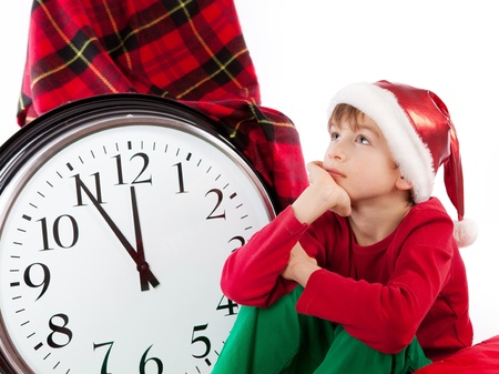 Baby in Santa Claus hat waiting for gift, insulationの写真素材