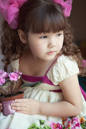 Portrait of girl with violetの写真素材