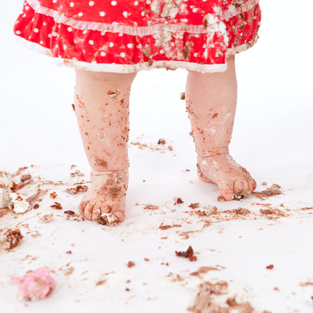 dirty baby feet on white background, studioの写真素材