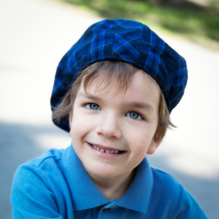 Closeup portrait of cute little boy laughingの写真素材