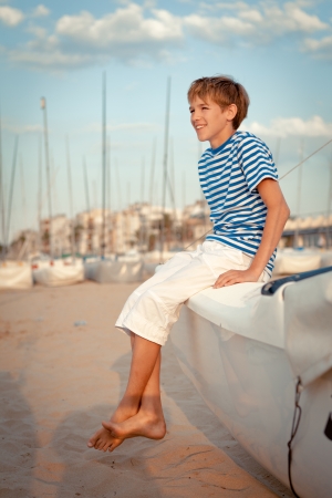 Portrait of young sailor near yacht, outdoorの写真素材