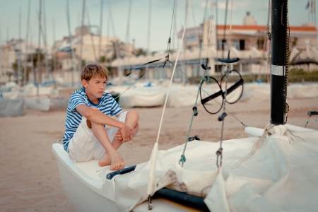 Portrait of young sailor near yacht, outdoorの写真素材