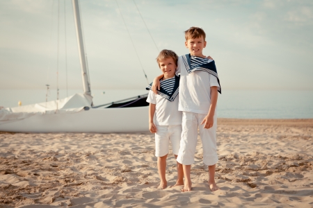 Portrait of young sailors near yacht, outdoorの写真素材