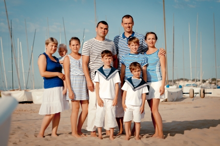 Portrait of happy family near yacht, outdoorの写真素材