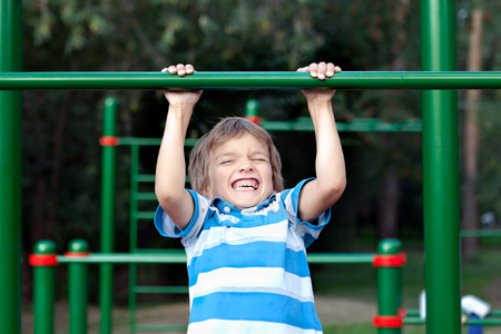 Child playing sports outdoors