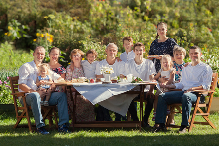 Most beautiful happy family in garden, portrait of three generations, outdoorの写真素材
