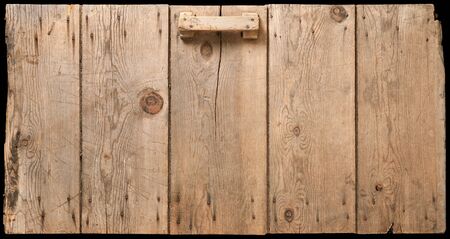 Old Corn Crib Door isolated on blackの写真素材