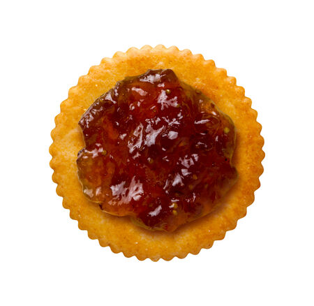 Fig Spread on a Round Cracker isolated on a white background. Viewed from above.の写真素材