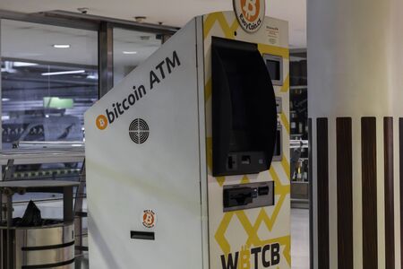 Prague, Czech Republic - May 18th 2019: Bitcoin ATM machine for buy and sell cryptocurrency. Concept pay mobile phone, Prague, Czech Republic. An Illustrative Editorial Image.のeditorial素材
