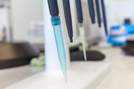 Automatic pipettes are on the holder. Chemical or Clinical laboratory tools.の写真素材