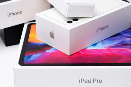 Iphone 11 and iPadPro with apple pencil boxes. March 2021, San Francisco, USA